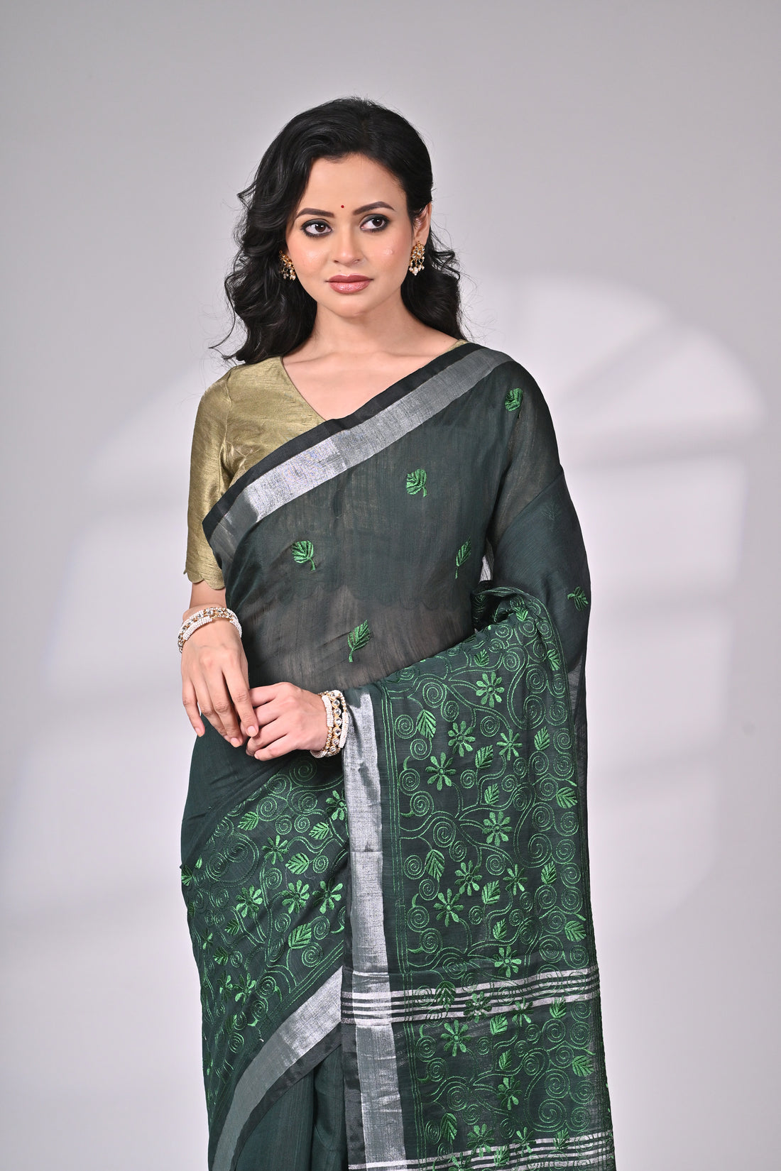 Emerald Green Mul Cotton Saree with Silver Zari Border and Embroidery