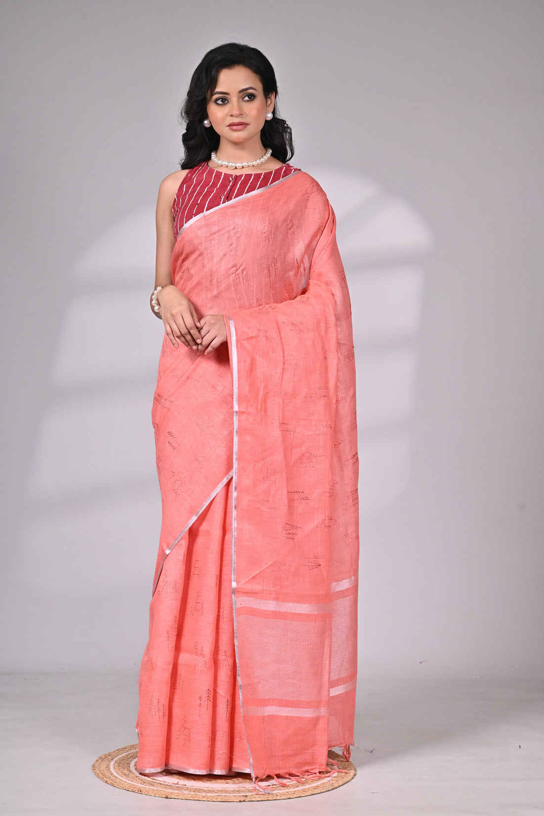 Coral Linen Saree with Subtle Embroidery