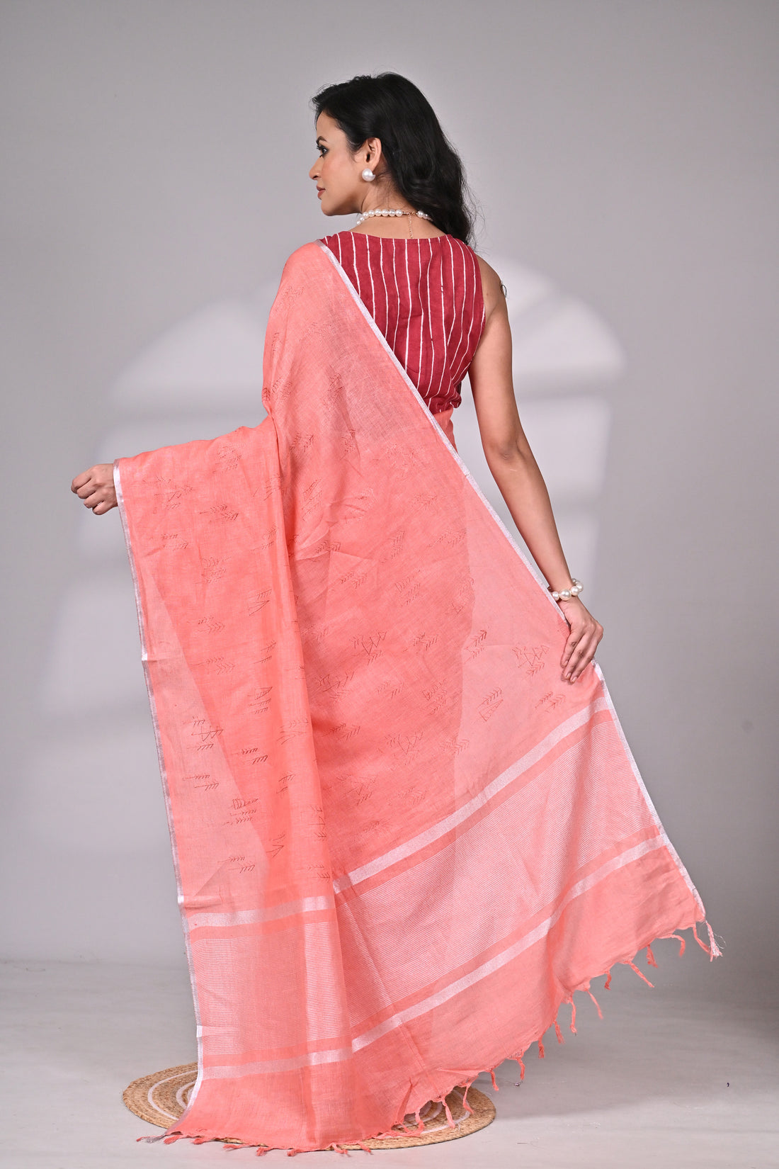 Coral Linen Saree with Subtle Embroidery