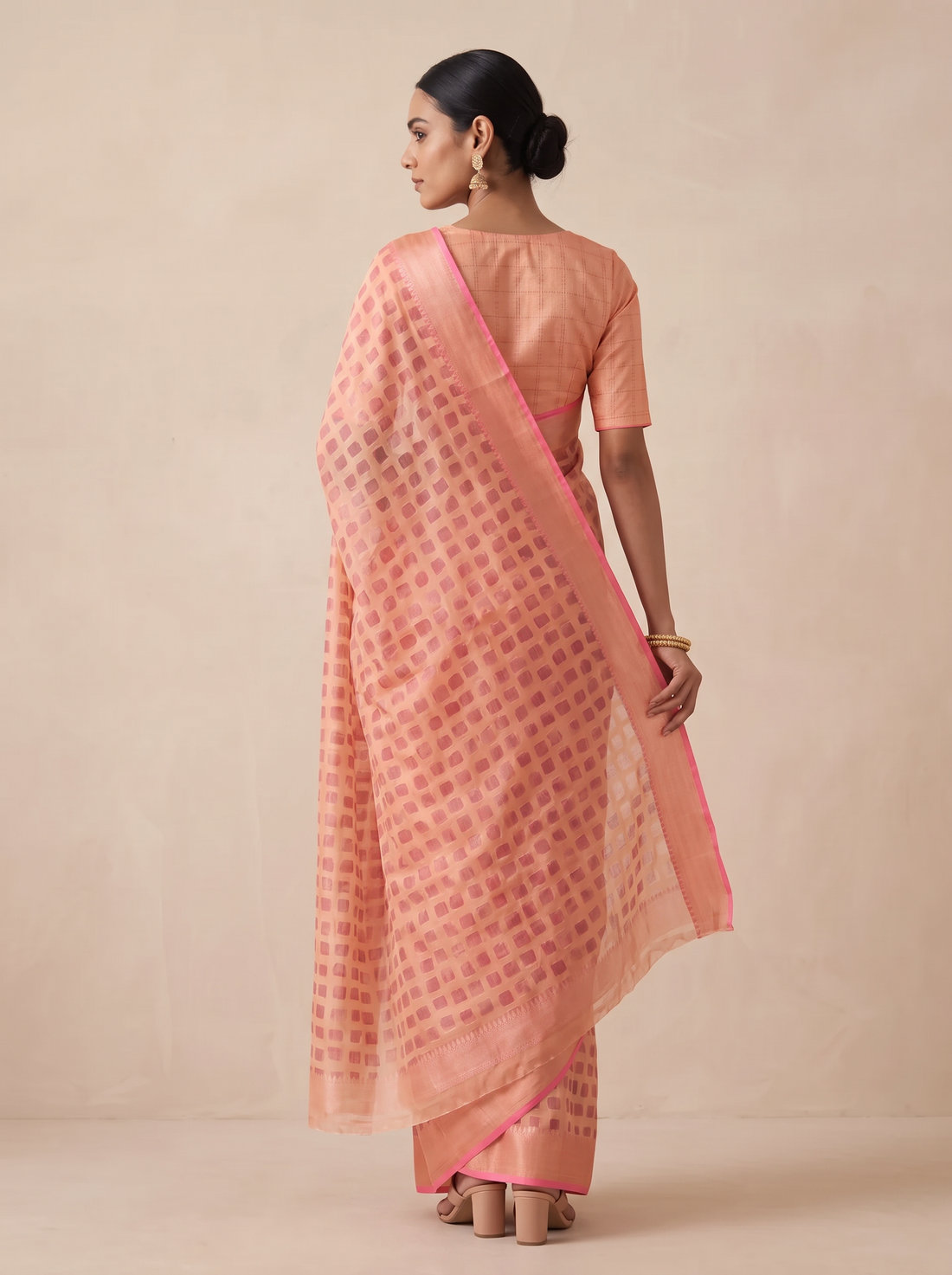 Peach Silk Blend Saree with Golden Motifs