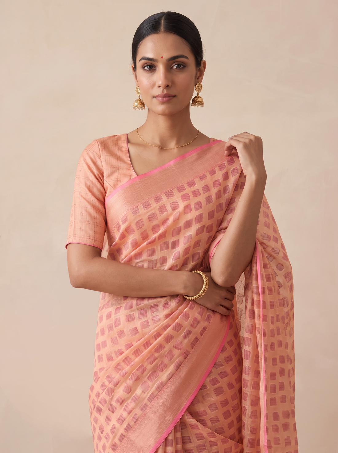 Peach Silk Blend Saree with Golden Motifs