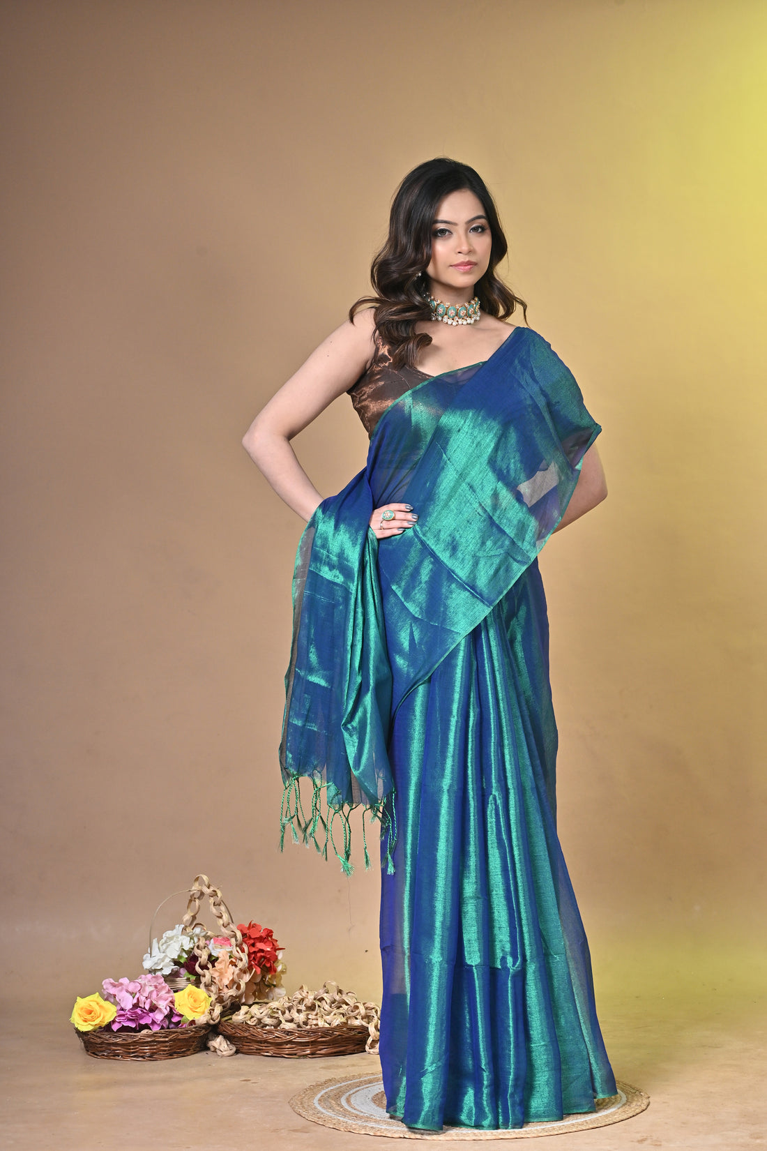 Teal Green Tissue Ragha Saree with Elegant Textured Finish