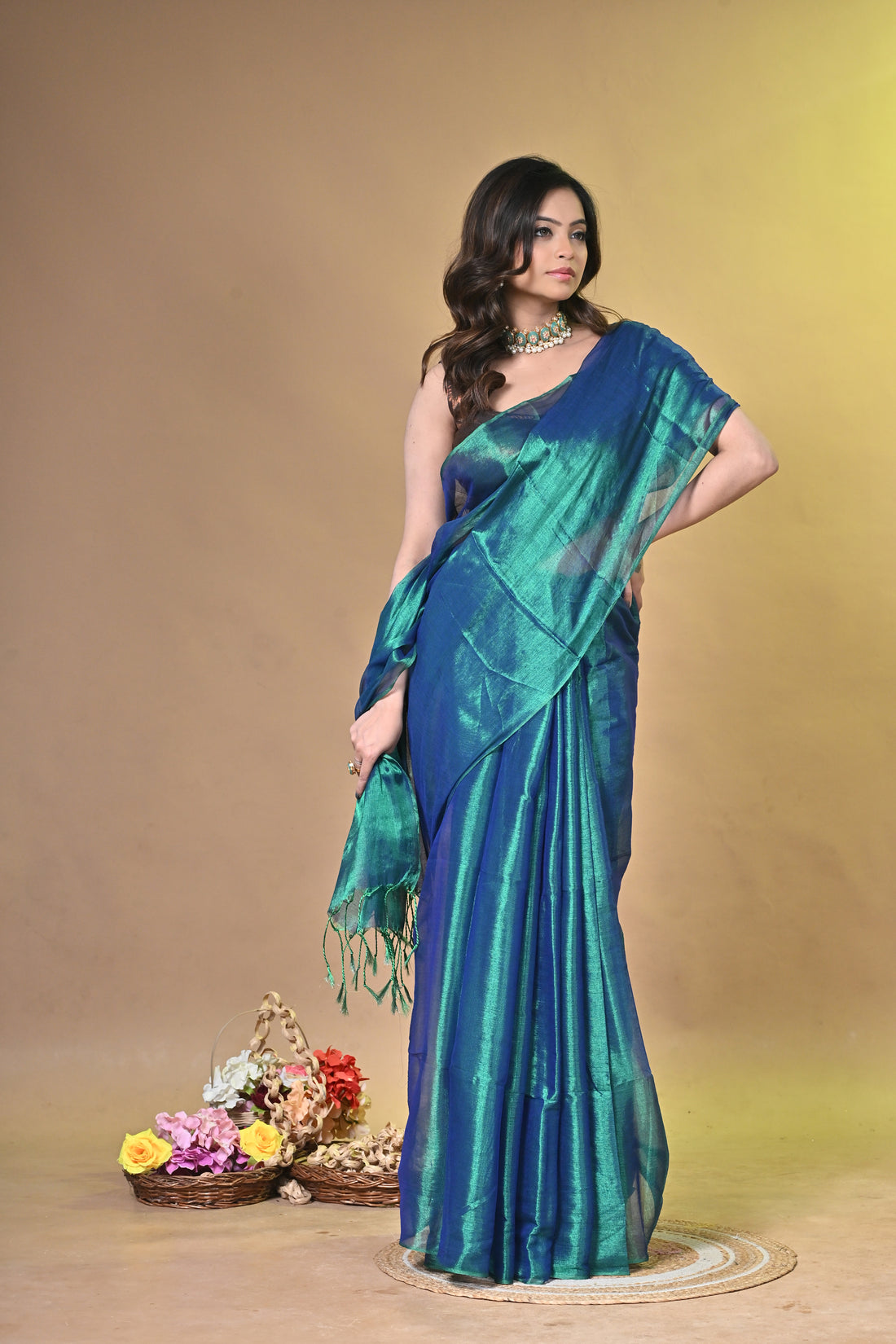 Teal Green Tissue Ragha Saree with Elegant Textured Finish