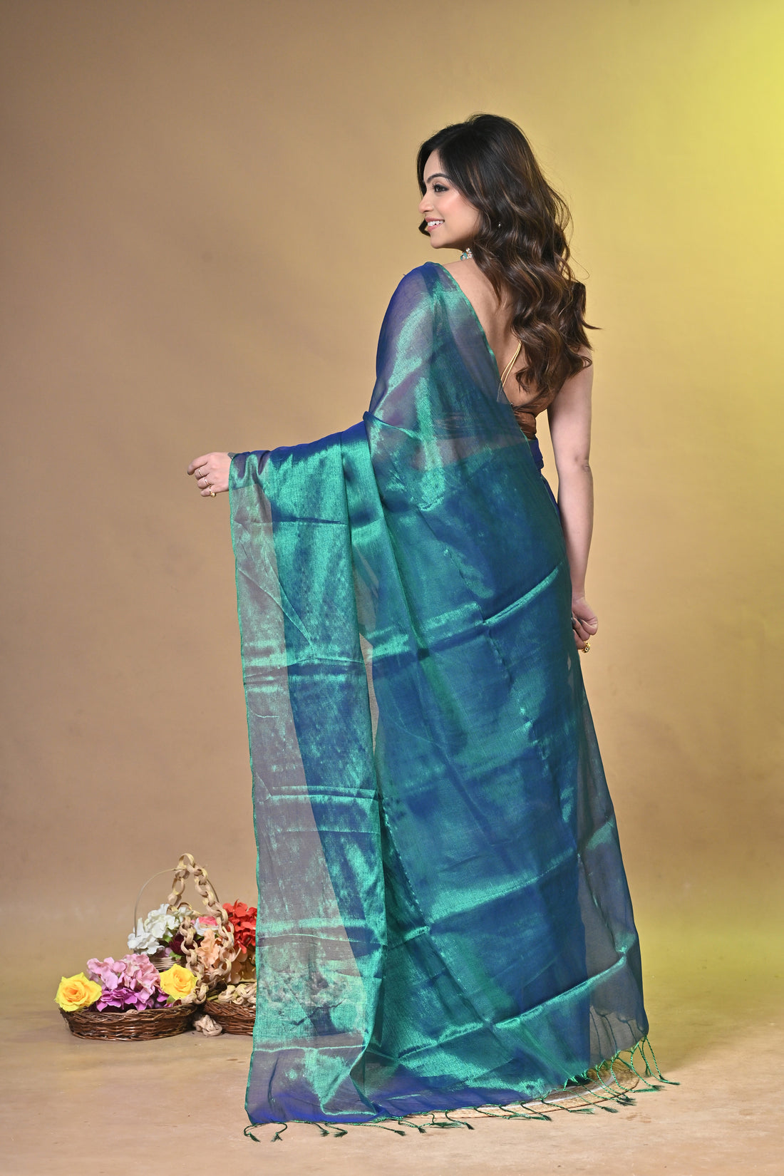 Teal Green Tissue Ragha Saree with Elegant Textured Finish