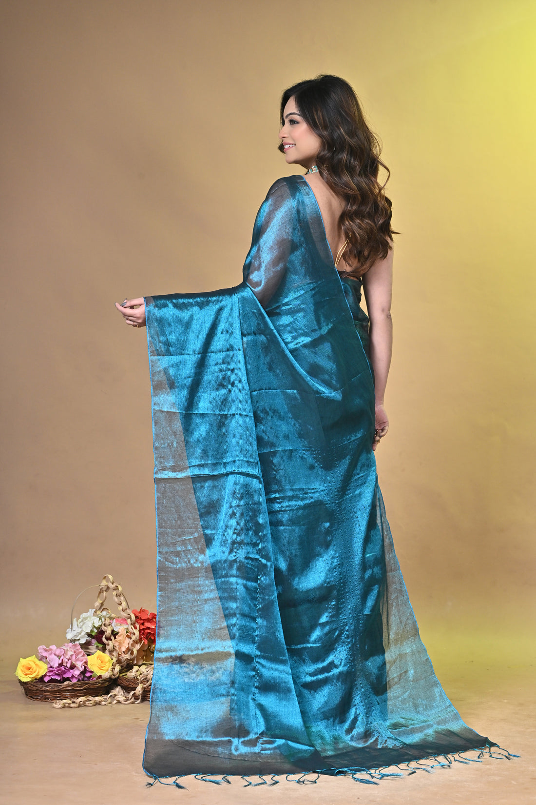 Turquoise Blue Tissue Ragha Saree with Elegant Textured Finish