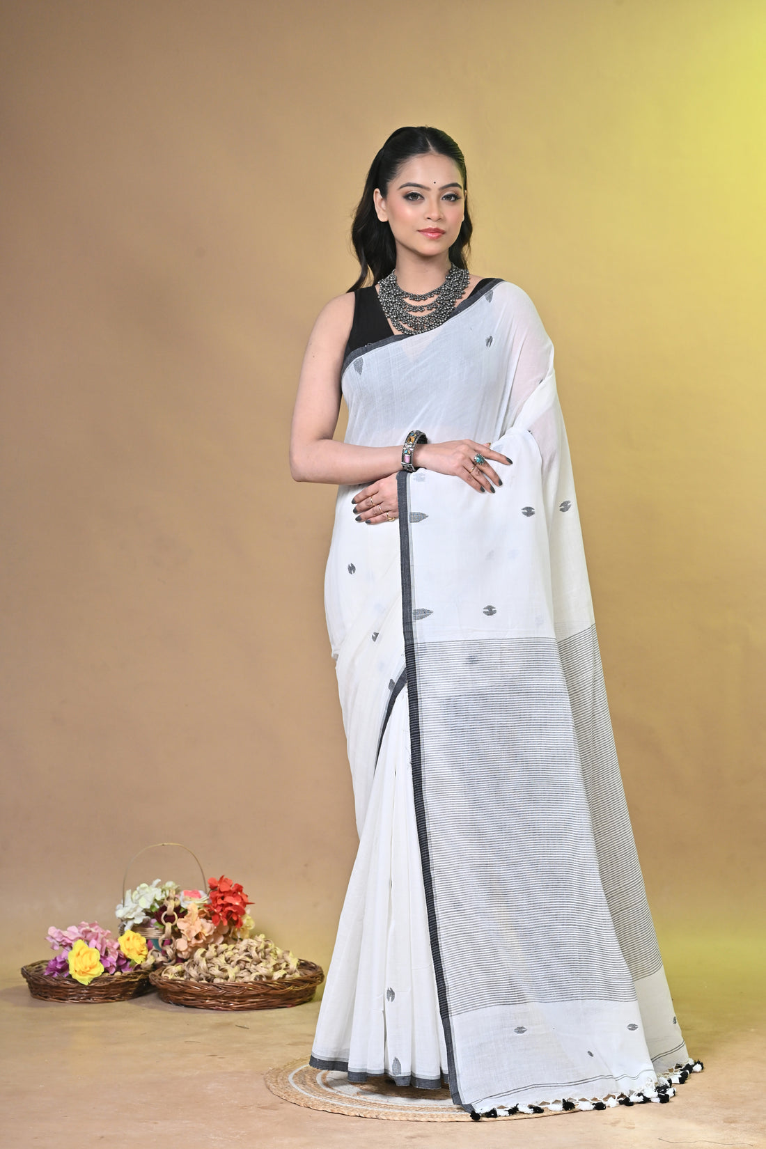 Off White Pure Cotton Handloom Saree with Striped Design and Tassel Pallu