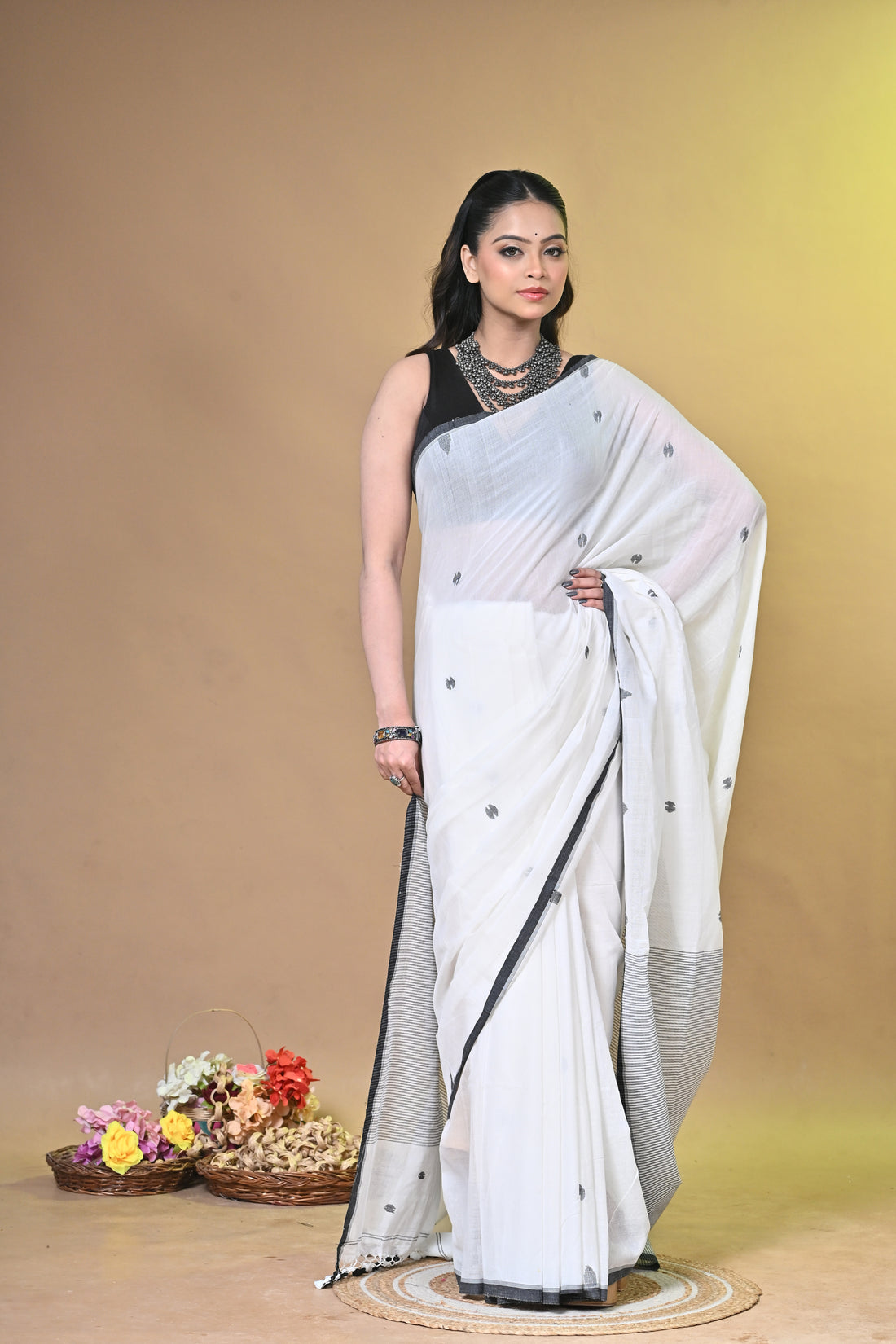 Off White Pure Cotton Handloom Saree with Striped Design and Tassel Pallu