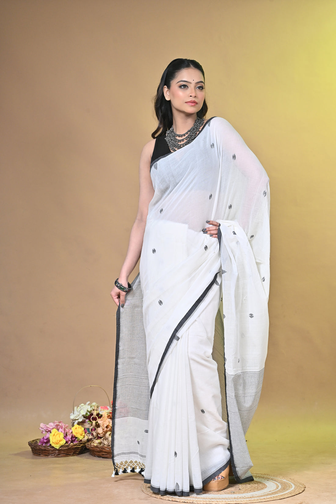 Off White Pure Cotton Handloom Saree with Striped Design and Tassel Pallu