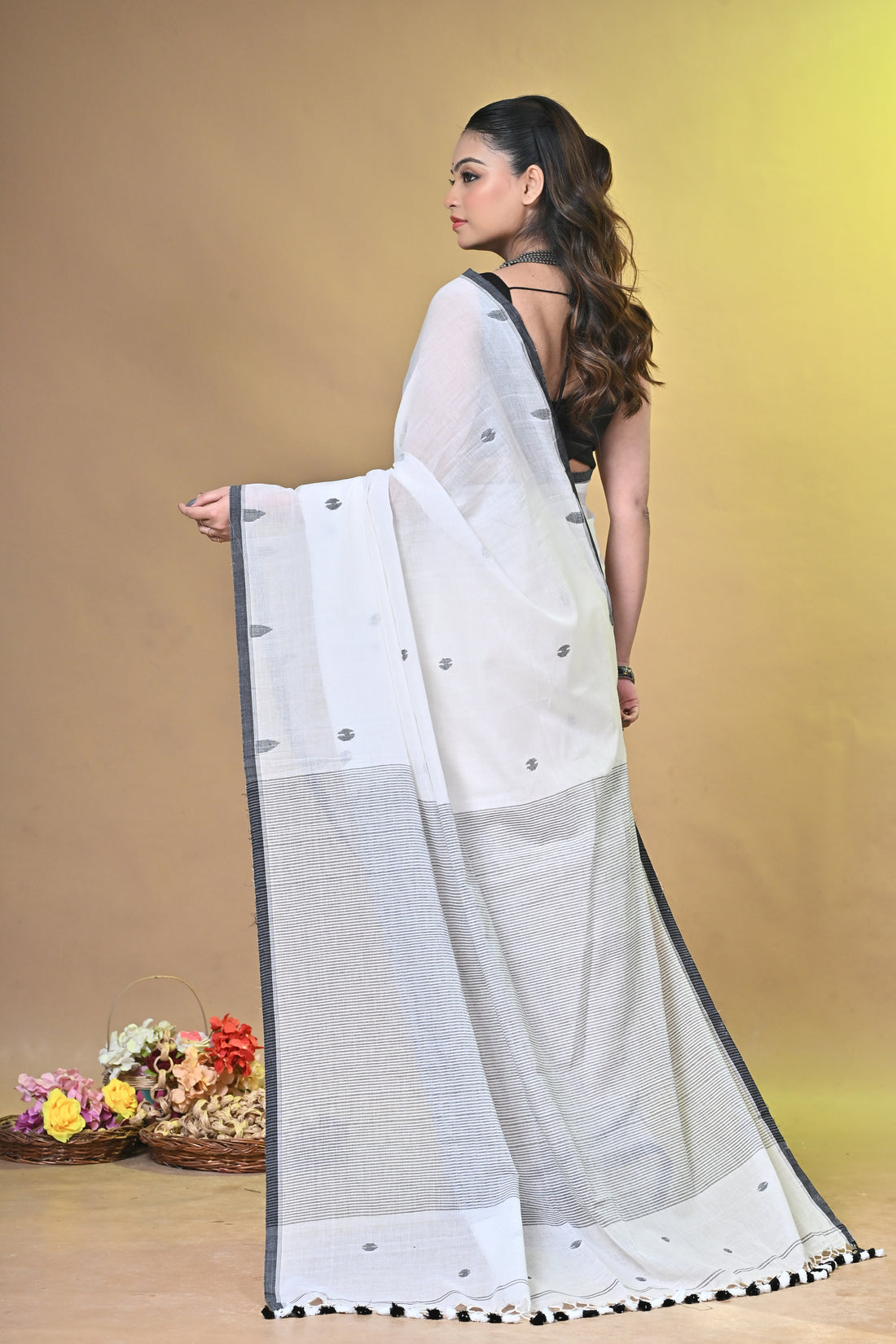 Off White Pure Cotton Handloom Saree with Striped Design and Tassel Pallu