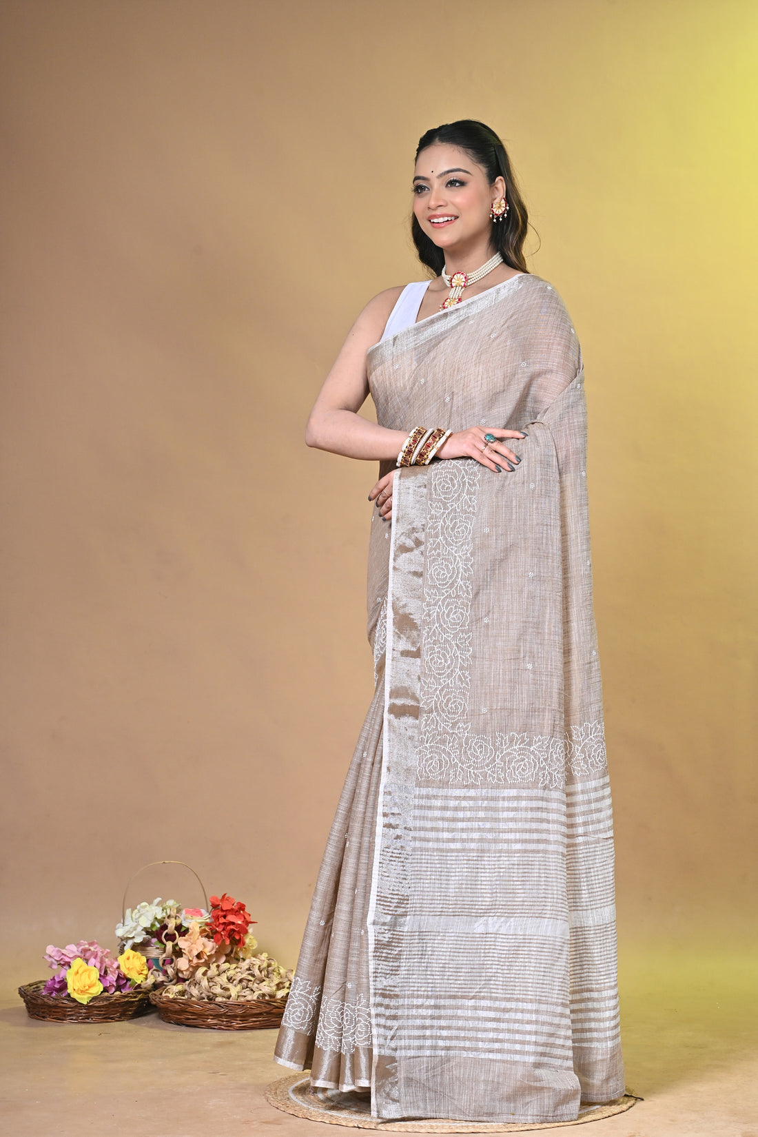 Brown Linen Sabudana Saree with Floral Woven Border