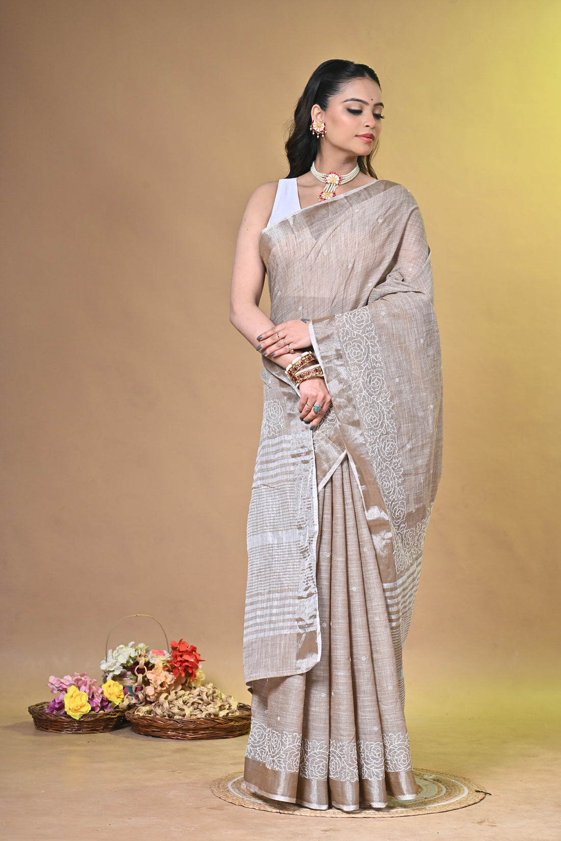 Brown Linen Sabudana Saree with Floral Woven Border
