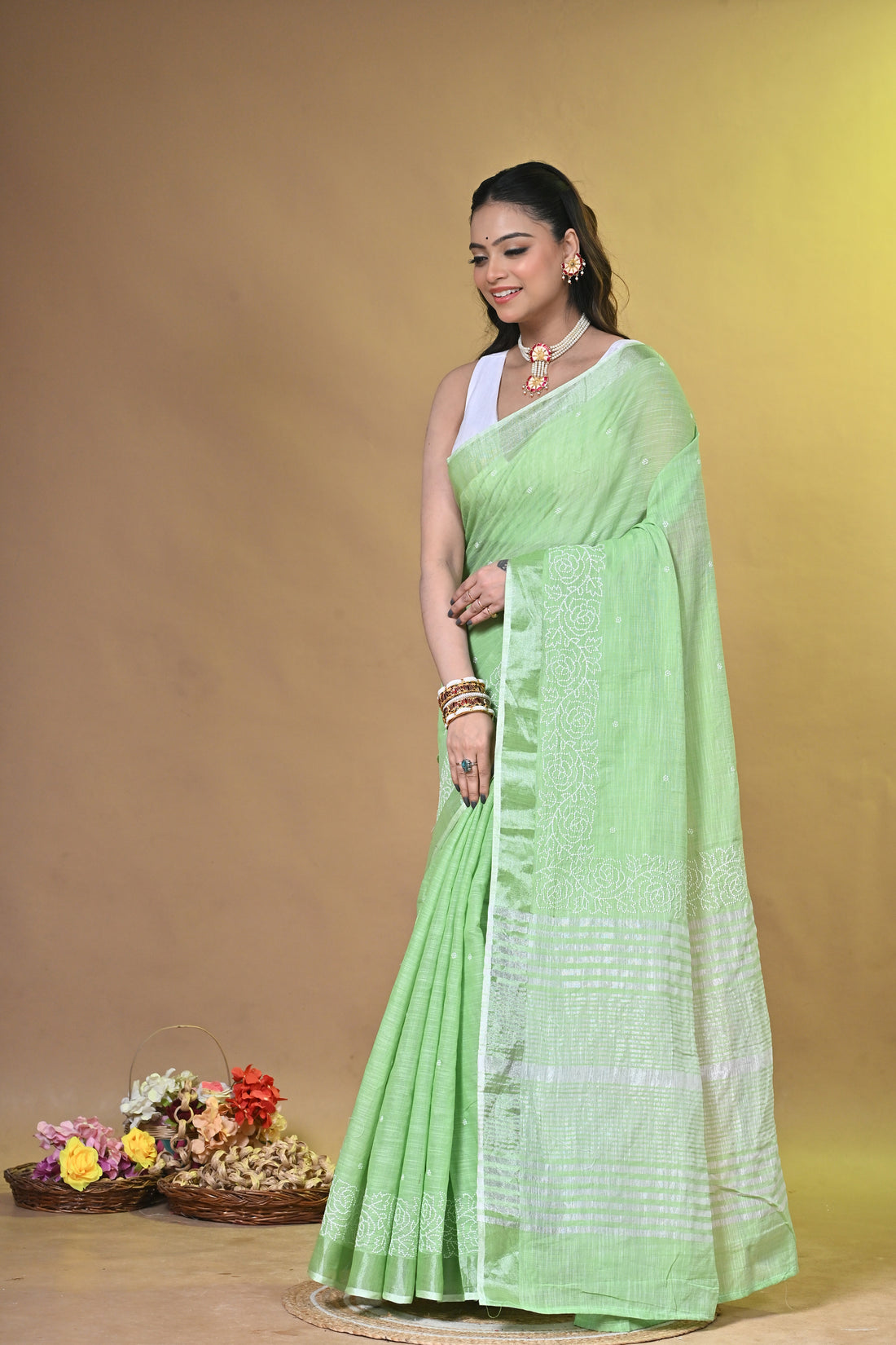 Green Linen Sabudana Saree with Floral Woven Border