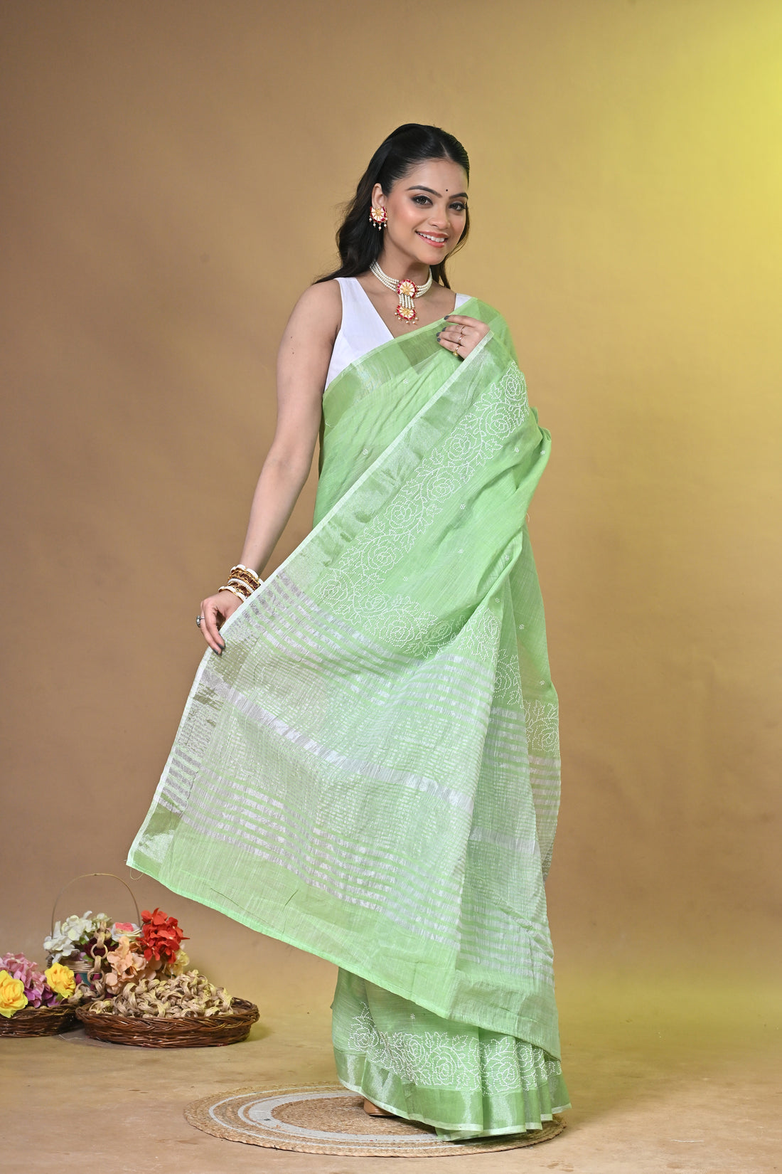 Green Linen Sabudana Saree with Floral Woven Border