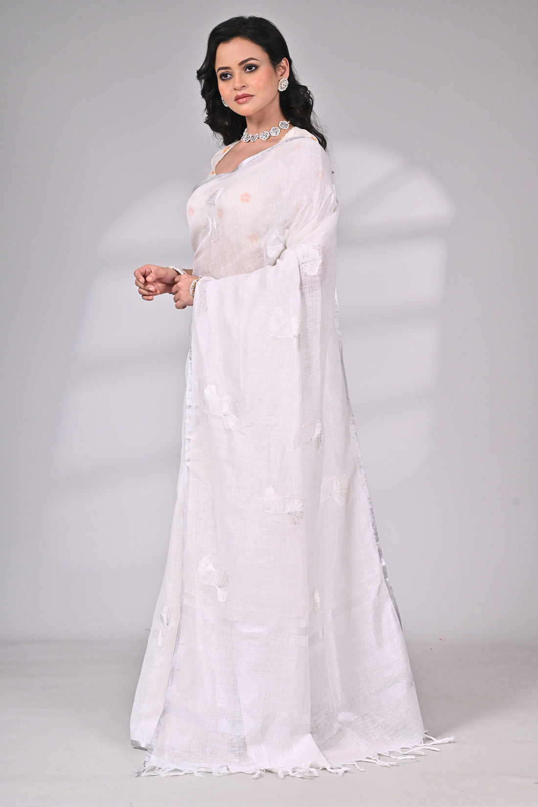 Linen Saree in Classic White with Subtle Thread Motifs