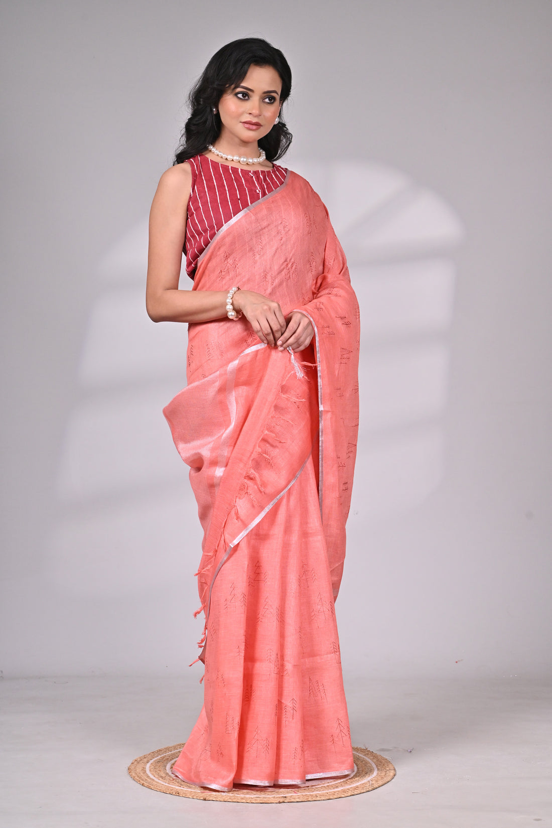 Coral Linen Saree with Subtle Embroidery