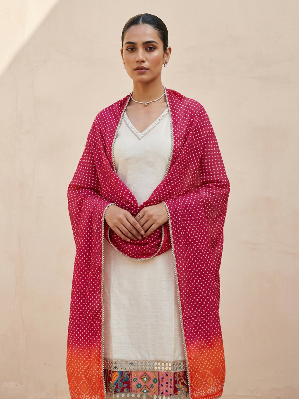 Cream kurta set with bandhani dupatta
